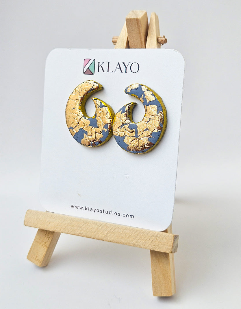 Gilded Crescent Statement Studs